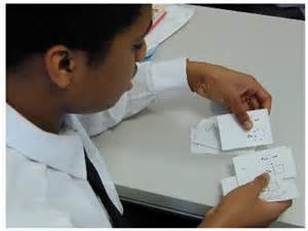 Male student using flaschcards