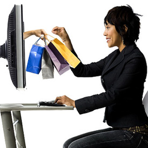 Female employee shopping online at work